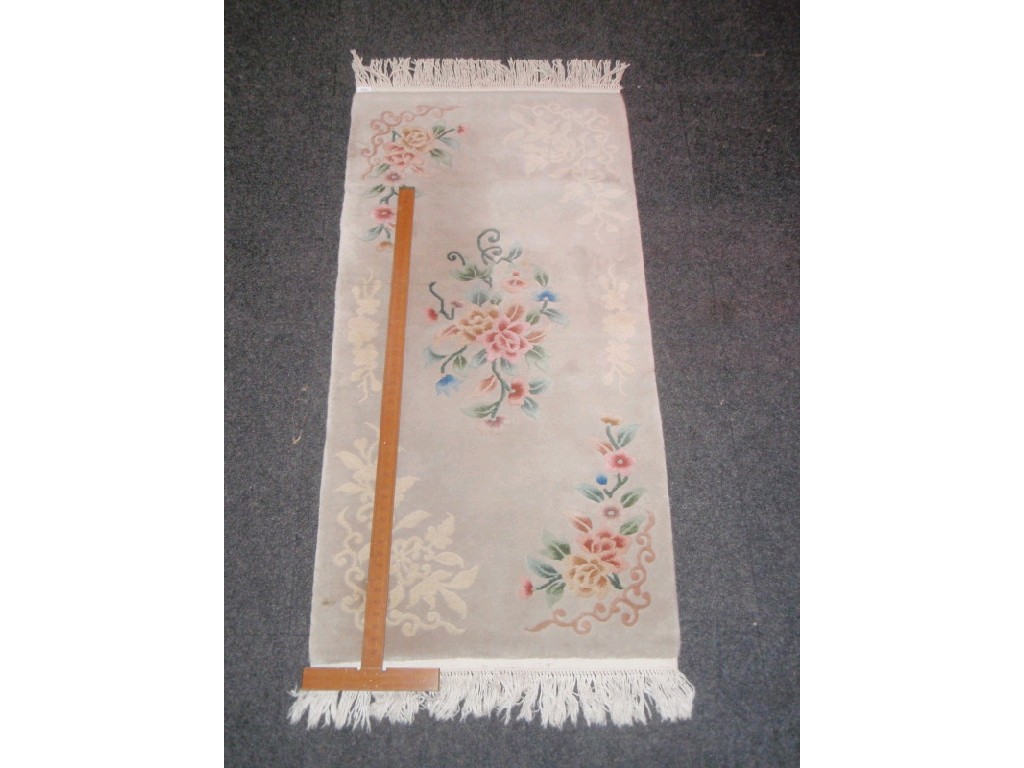 Appraisal: A modern Chinese hand cut wool rug cm x cm