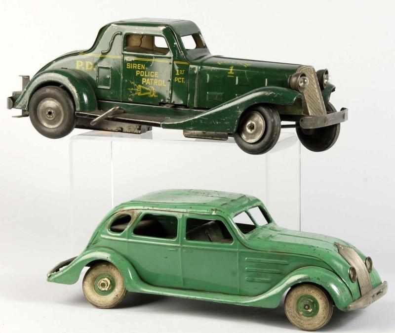 Appraisal: Lot of Pressed Steel Automobile Toys Description American Includes Marx