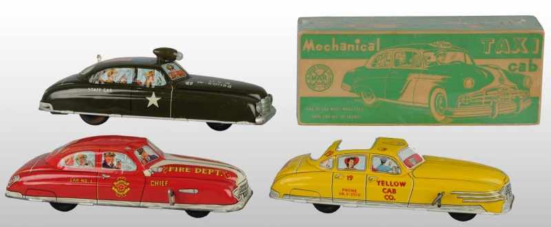 Appraisal: Lot of Tin Litho Marx Automobile Wind-Up Toys Description American