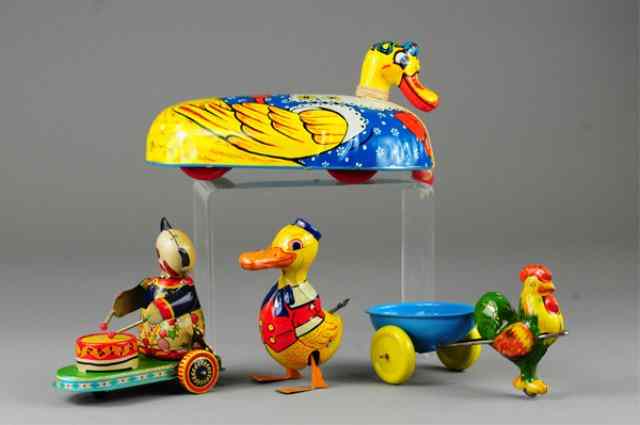 Appraisal: GROUPING OF TIN TOYS Lithographed tin includes Chein mechanical walking