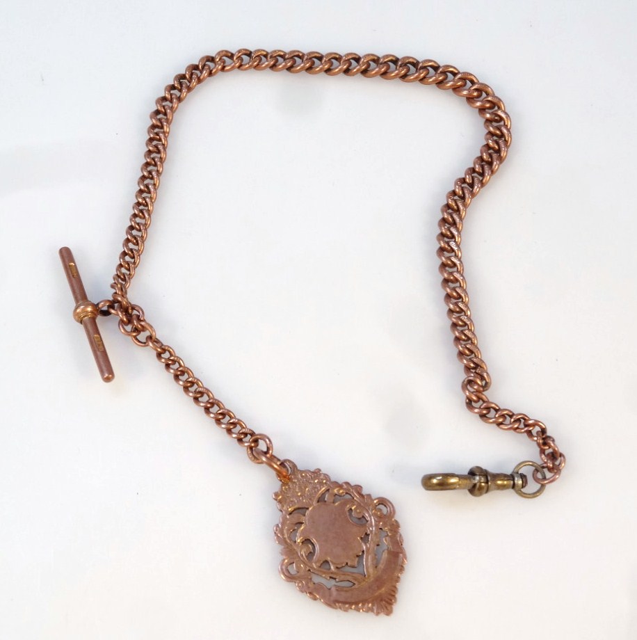 Appraisal: A rose gold graduated Albert watch chain with 'T' bar