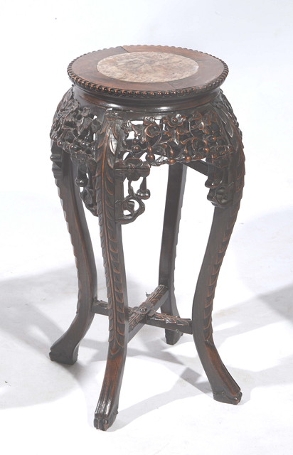 Appraisal: A CHINESE HARDWOOD URN STAND with circular top having a