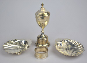 Appraisal: Two silver shell butter dishes a small trophy cup and