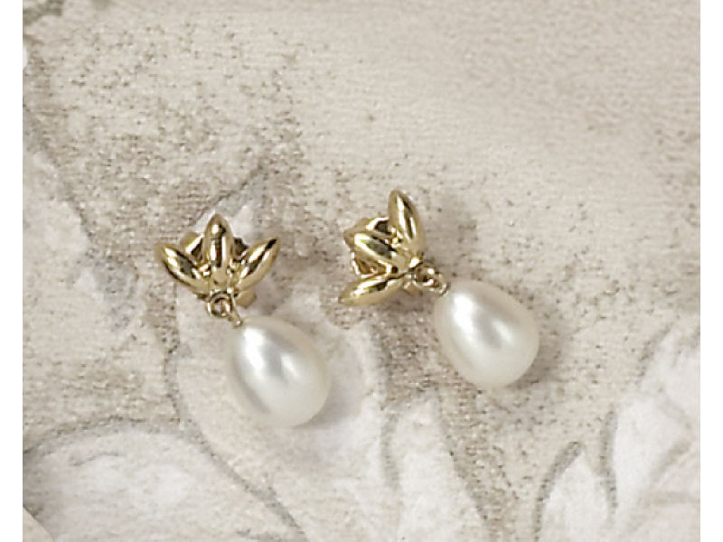 Appraisal: PEARL EARRINGS Tiffany Co k yellow gold pierced earrings with