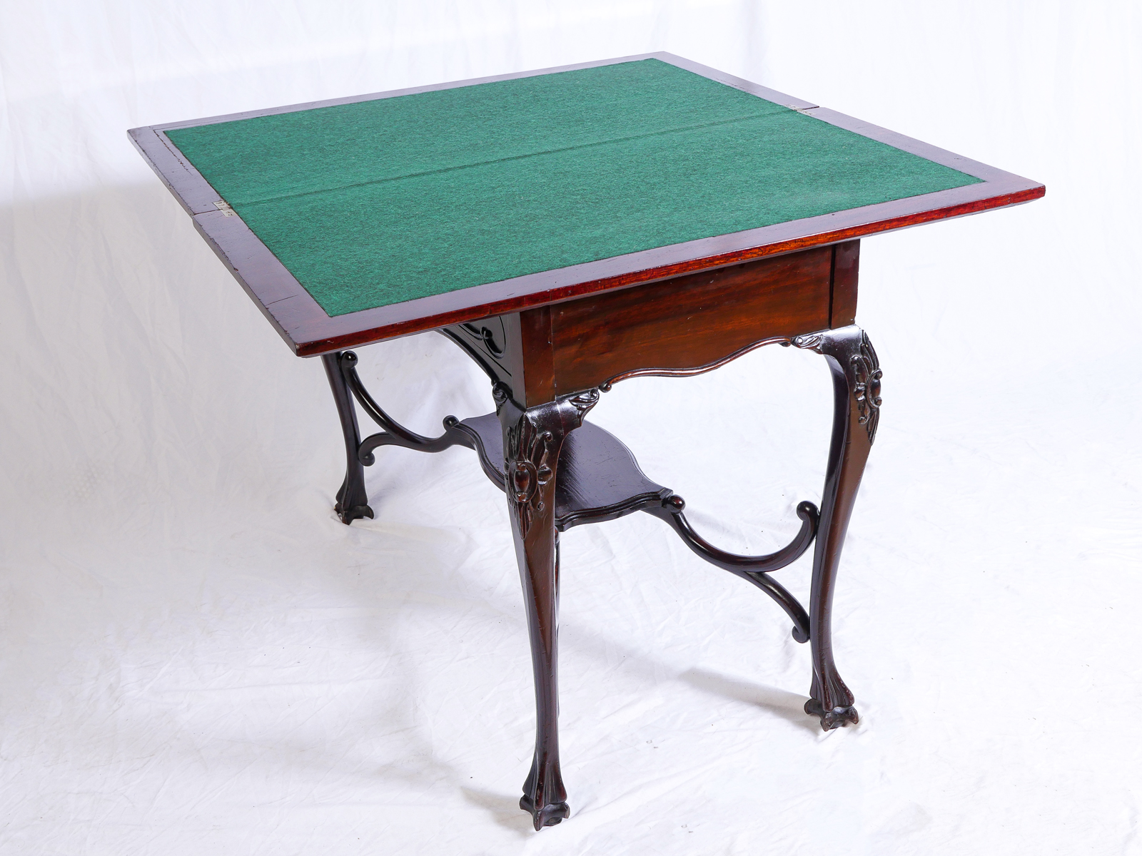 Appraisal: TH CENTURY MAHOGANY GAME TABLE With elaborate carving and rare