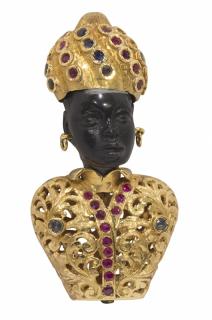 Appraisal: Blackamoor ruby sapphire and k yellow gold brooch Blackamoor ruby