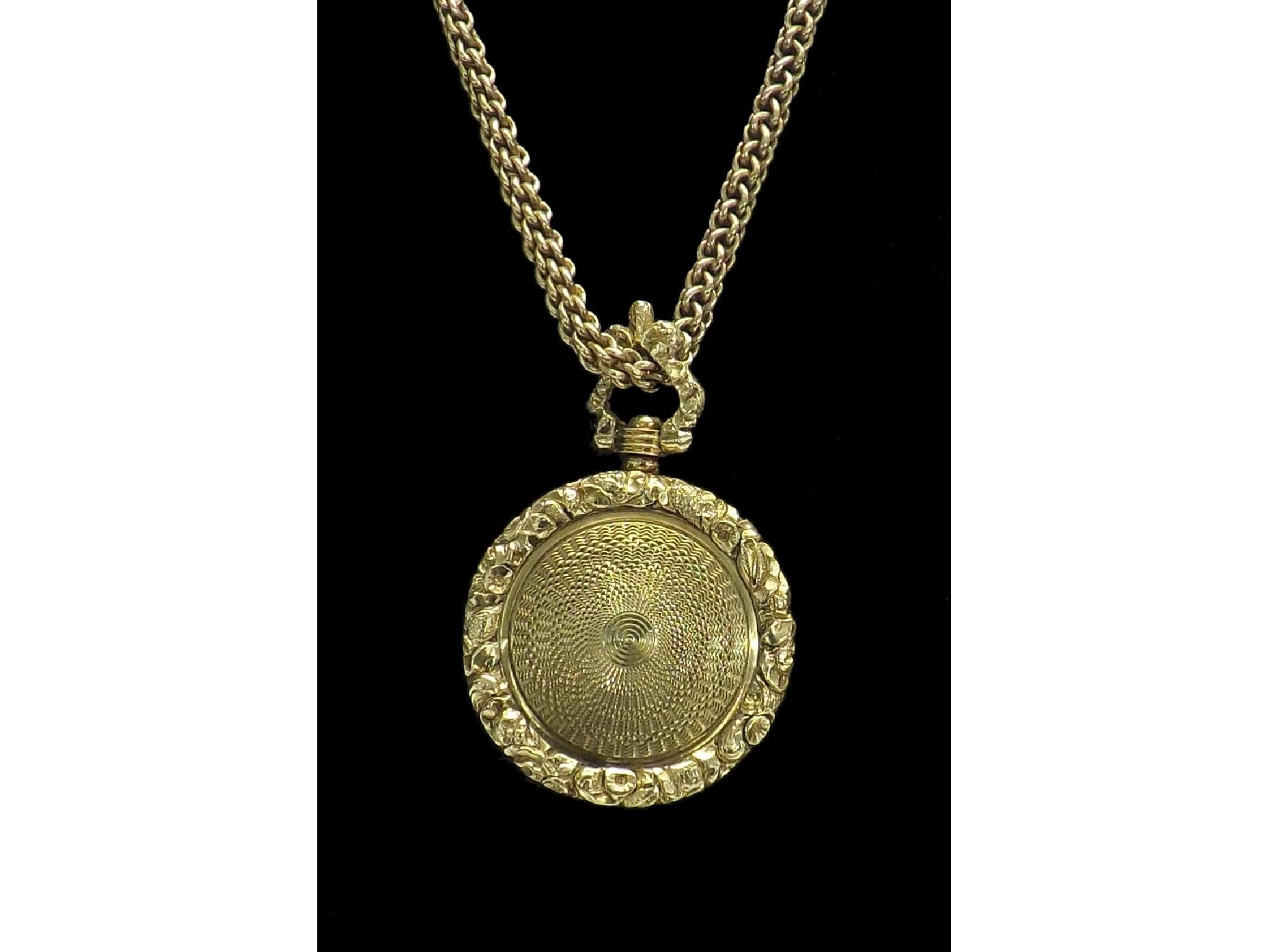 Appraisal: Antique yellow metal engine turned circular locket pendant on chain