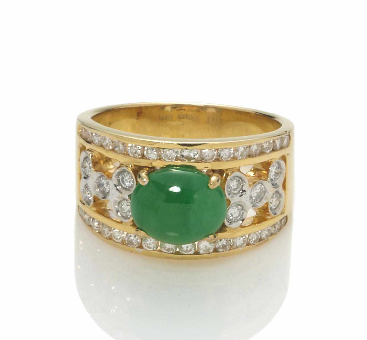 Appraisal: A jadeite jade and diamond ring oval-shaped jade cabochon measuring