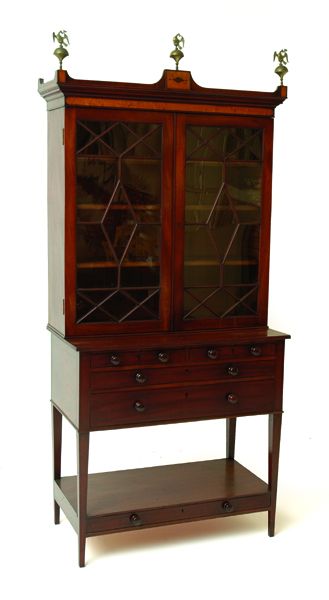 Appraisal: A REGENCY STYLE MAHOGANY AND SATIN WOOD BOOK CABINET The