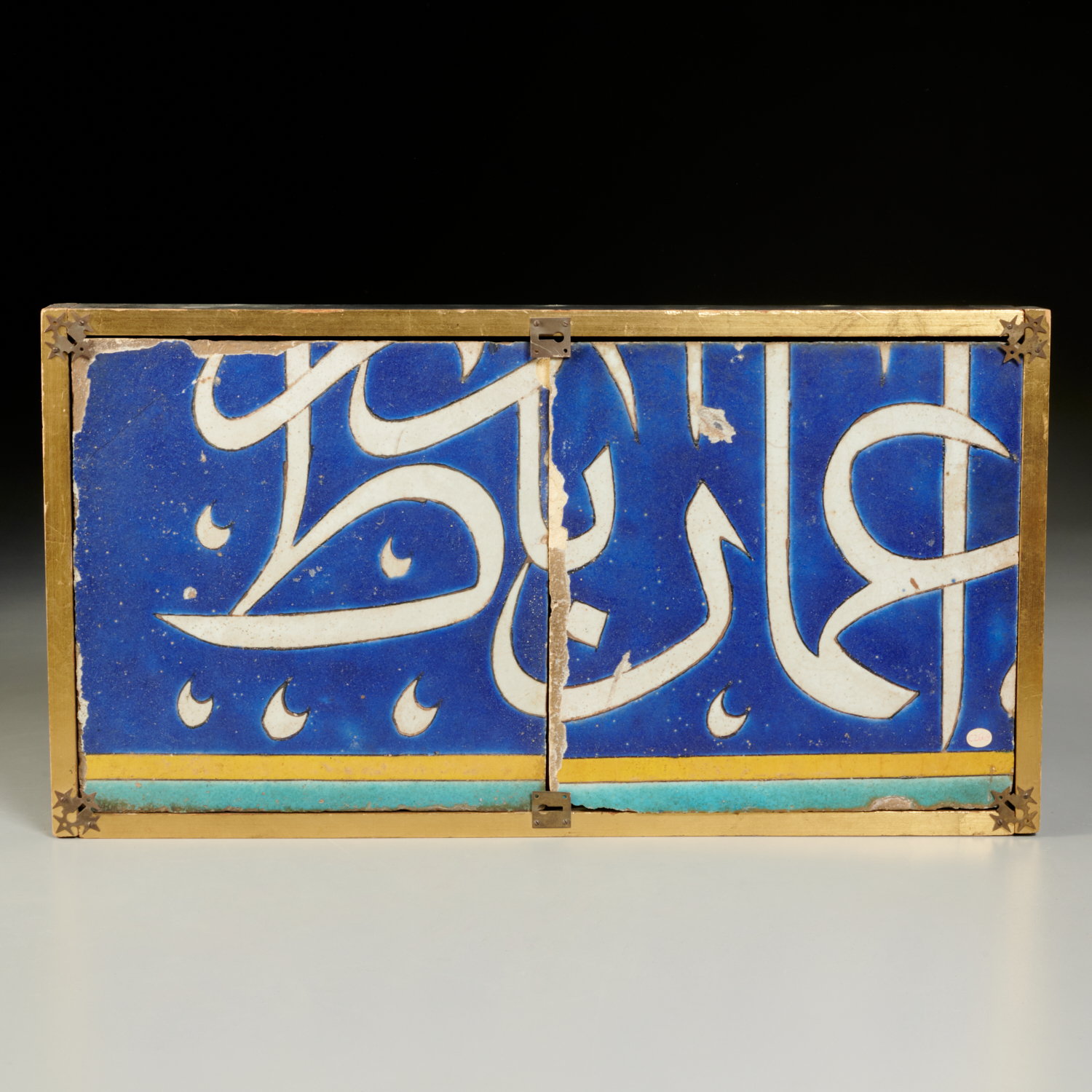 Appraisal: PERSIAN SAFAVID CALLIGRAPHIC POTTERY TILE PANEL c th c modern