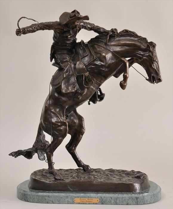 Appraisal: AFTER FREDERIC REMINGTON BRONCO BUSTER Bronze on green marble stand