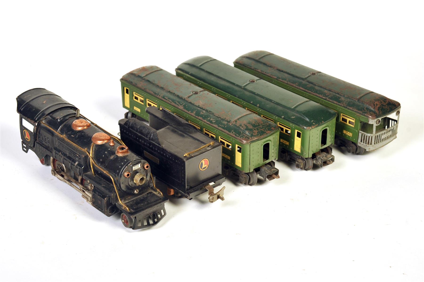 Appraisal: LIONEL O GAUGE FOUR-PIECE STEAM PASSENGER CONSIST INCLUDING ENGINE E