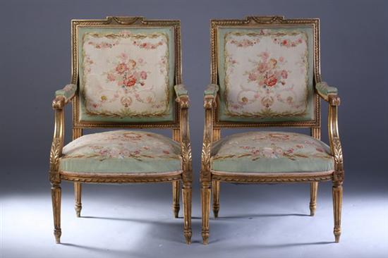 Appraisal: FOUR LOUIS XVI GILTWOOD FAUTEUILS WITH AUBUSSON UPHOLSTERY early th