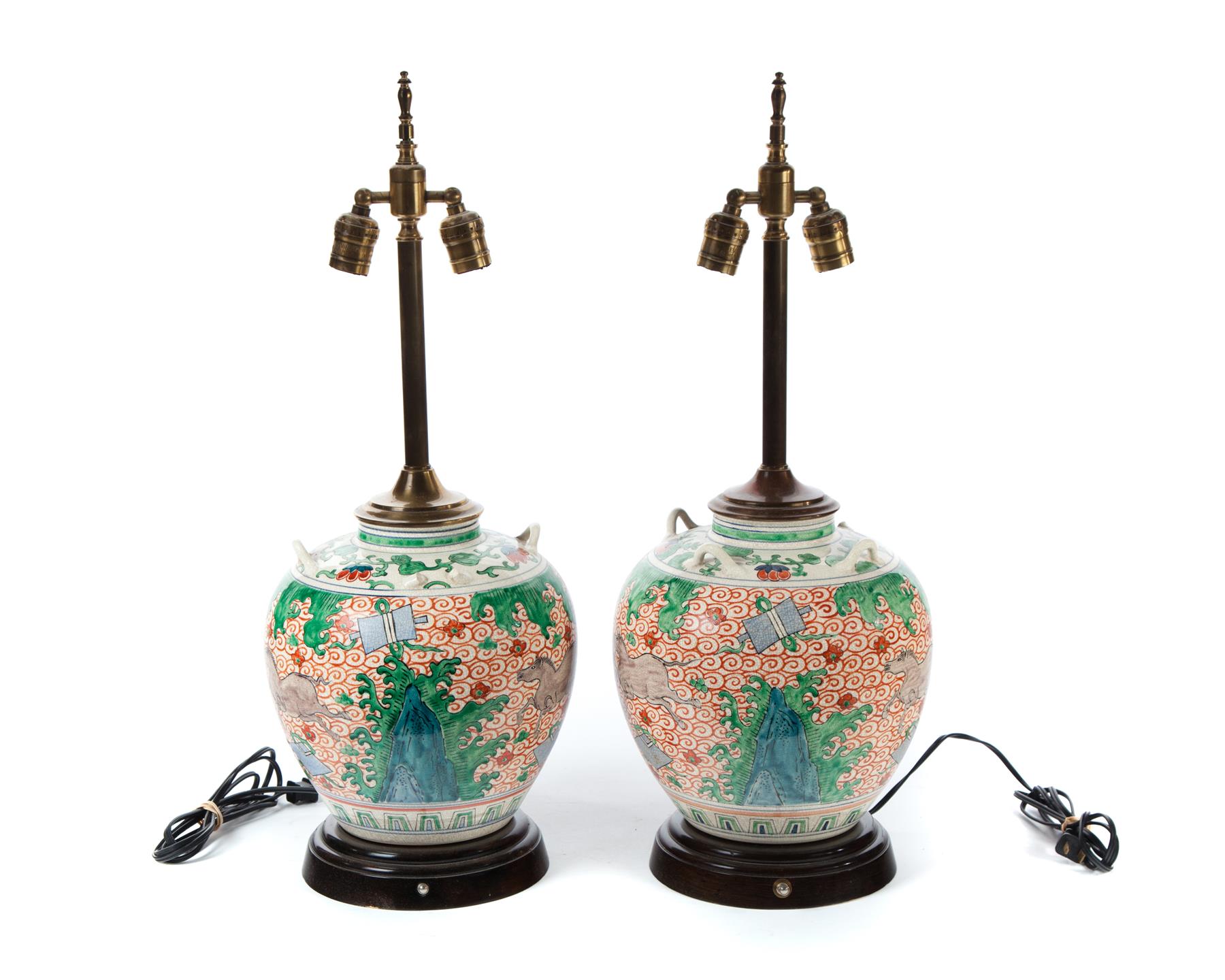 Appraisal: PAIR OF DECORATED CHINESE TABLE LAMPS Twentieth century Made from