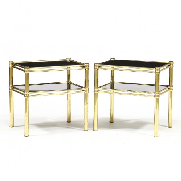 Appraisal: PAIR OF MODERN BRASS AND GLASS SIDE TABLES Post tubular