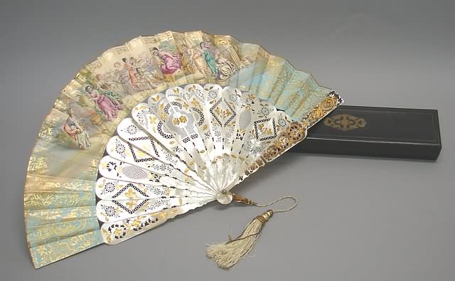 Appraisal: Mother-of-pearl sticks intricately decorated with gold reserves upper section painted