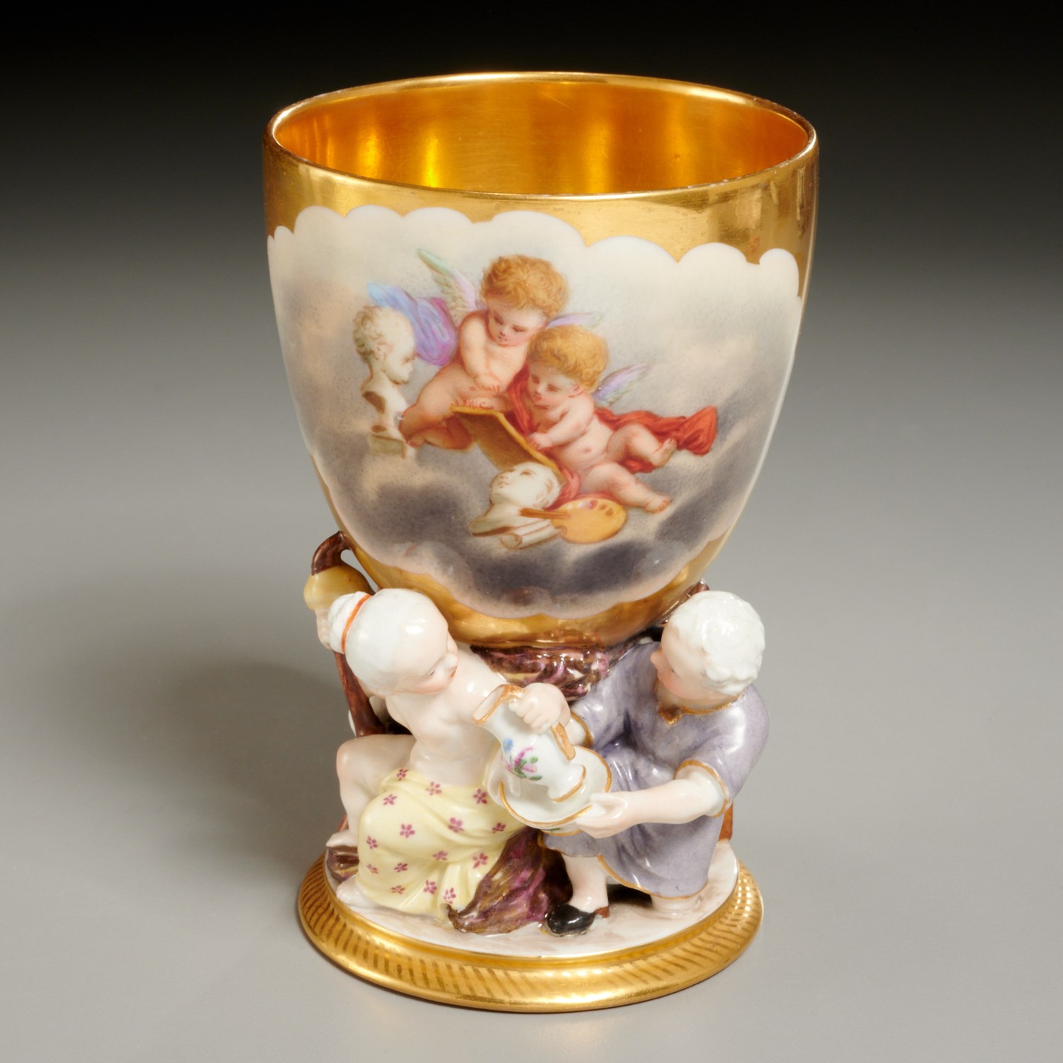 Appraisal: BERLIN GILT AND PAINTED PORCELAIN FIGURAL CUP th th c