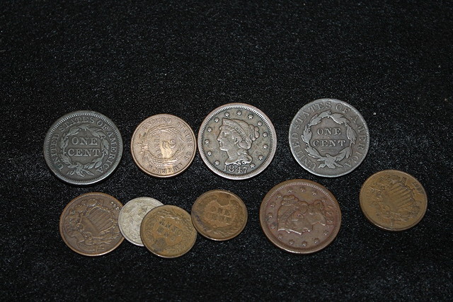 Appraisal: A COLLECTION OF NINE USA CENTS and two cents and