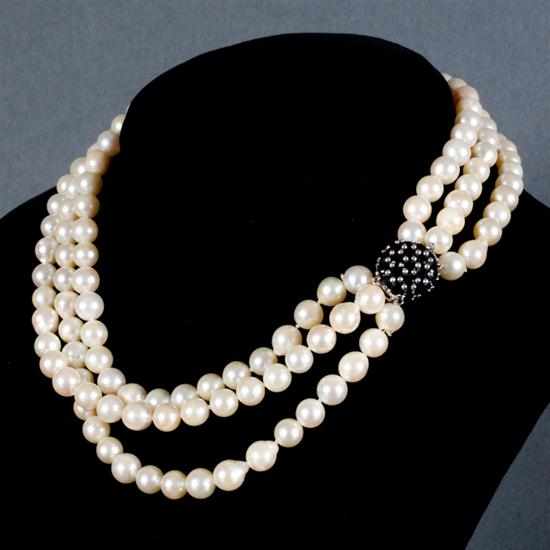 Appraisal: Lady's cultured pearl triple-strand necklace with a K white gold