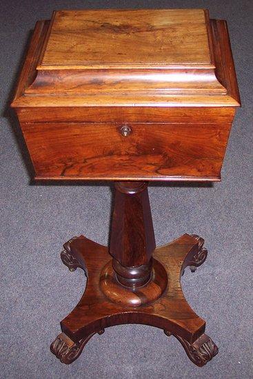 Appraisal: A th Century rosewood teapoy with a fitted interior consisting