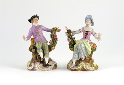 Appraisal: A near pair of Meissen figures of rustic lovers each