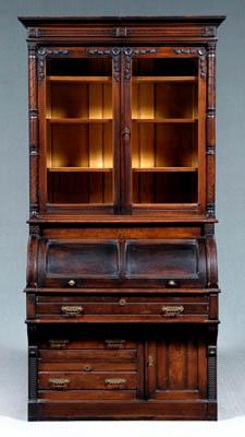 Appraisal: Victorian cylinder desk and bookcase in two sections upper case