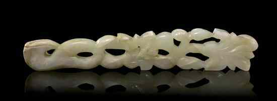 Appraisal: A Pierce Carved Jade Handle of celadon colored stone of