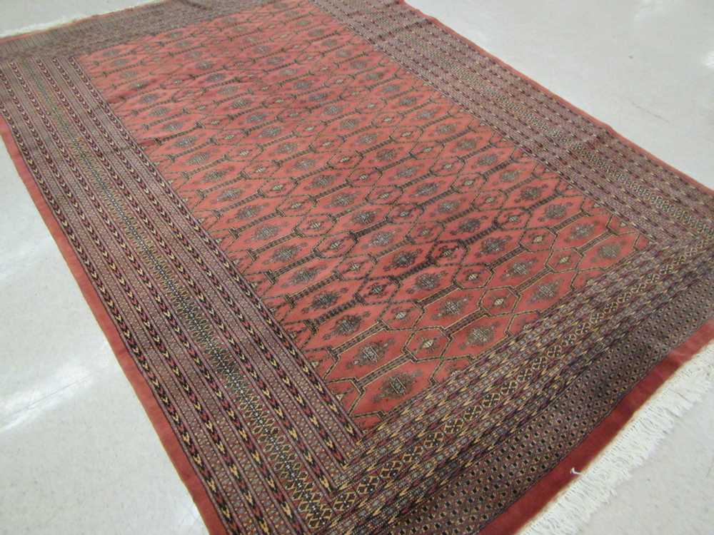 Appraisal: HAND KNOTTED ORIENTAL CARPET Indo-Turkoman repeating geometric bands and minor