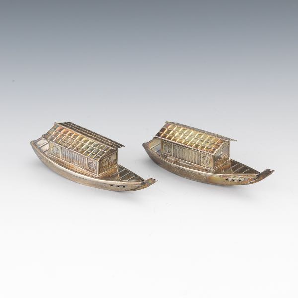 Appraisal: JAPANESE PAIR OF STERLING SILVER NOVELTY JUNK BOAT SALT PEPPER