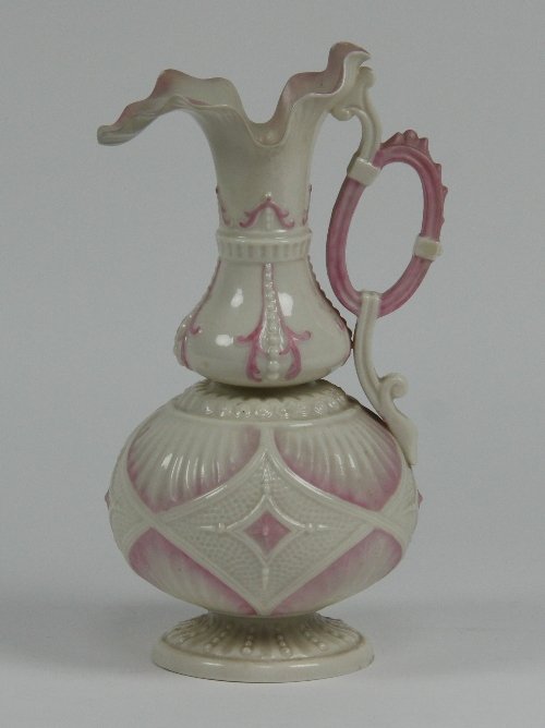 Appraisal: A Belleek jug coloured with pink cm high