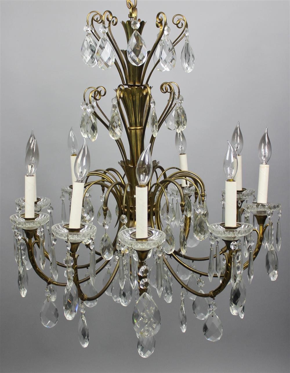 Appraisal: LOUIS XV STYLE BRASS AND CUT GLASS NINE LIGHT CHANDELIER