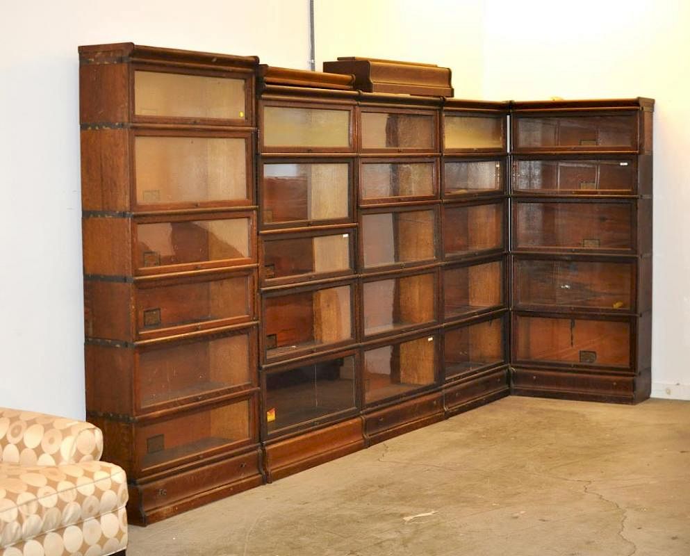 Appraisal: Five Globe-Wernicke Oak Bookcases Five Globe-Wernicke oak bookcases including three