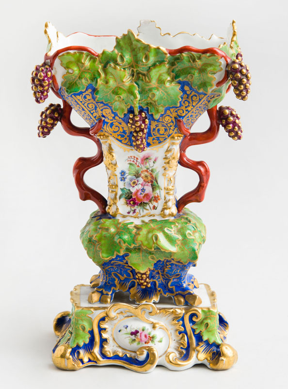 Appraisal: RUSSIAN PORCELAIN PAINTED AND PARCEL-GILT MANTLE VASE KORNILOV BROS ST