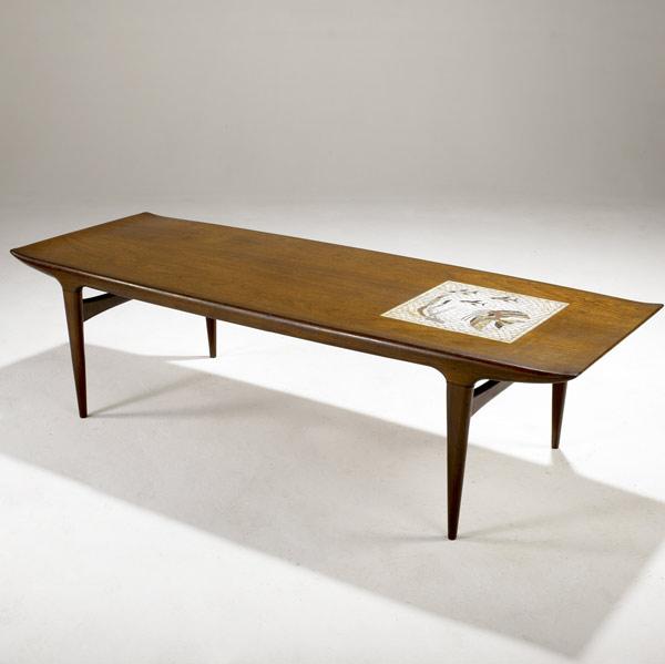 Appraisal: J CLAUSEN Denmark Coffee table in sculpted teak with decorative