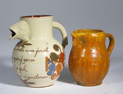 Appraisal: A C H Brannam Pottery fish jug painted in colours