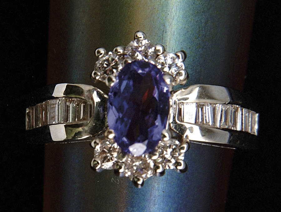 Appraisal: TANZANITE AND DIAMOND RING Very attractive kt white gold ring