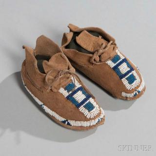 Appraisal: Cheyenne Beaded Hide Infant's Moccasins c s partially beaded with