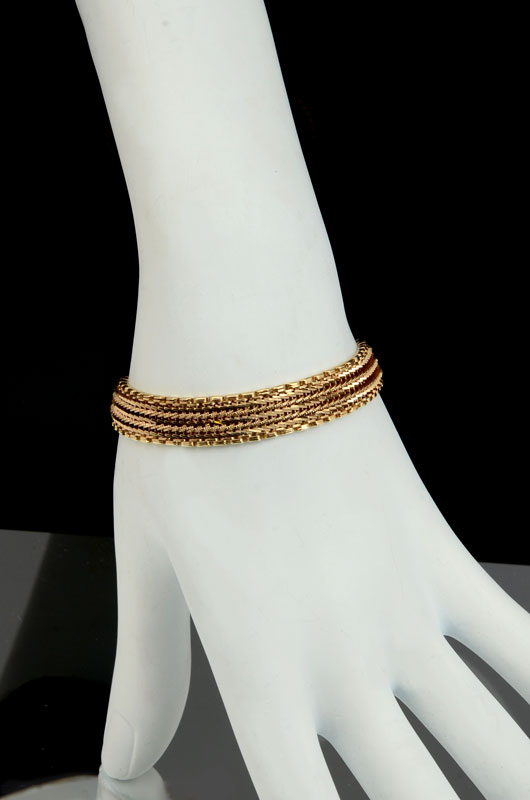 Appraisal: K DOUBLE CHEVRON BRACELET Beautifully crafted yellow gold bracelet feels