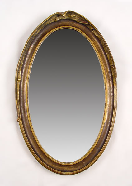 Appraisal: ART NOUVEAU OVAL WALL MIRROR Flowing carved gilt wood frame