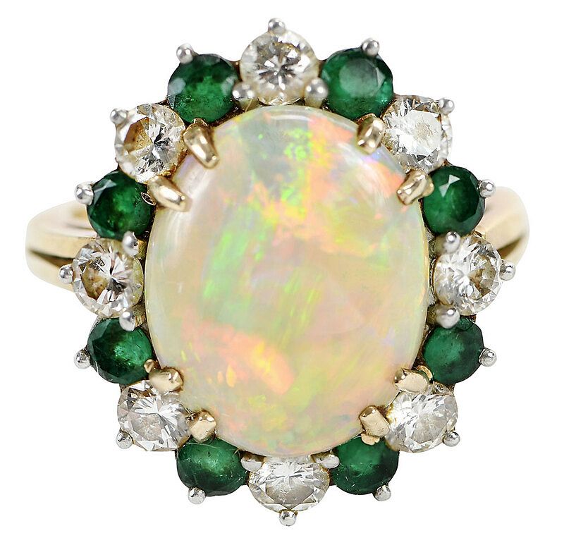 Appraisal: Platinum kt Opal Diamond and Emerald Ring one oval opal