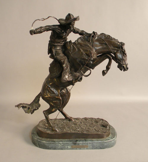 Appraisal: Bronze of a cowboy and horse after Remington h