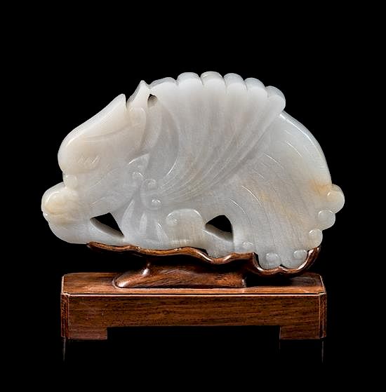 Appraisal: A White Jade Figure of Dragon Fish Height inches A