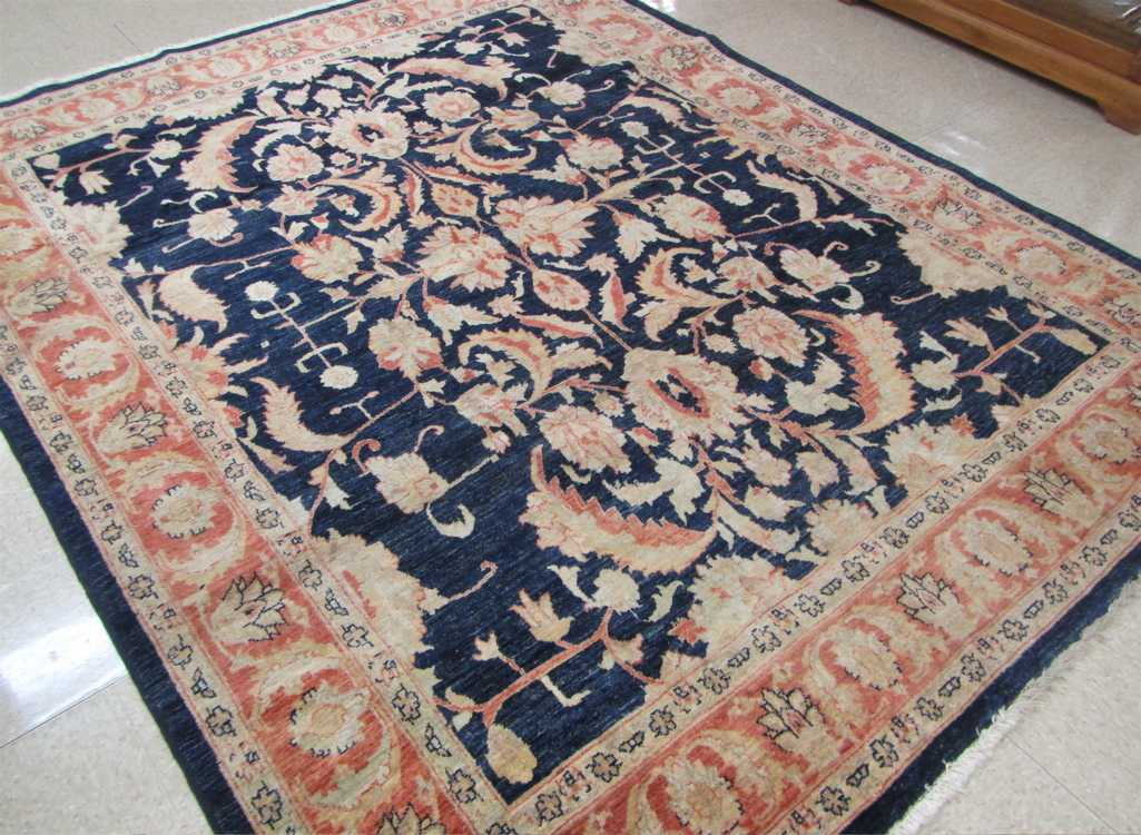 Appraisal: HAND KNOTTED ORIENTAL CARPET Pakistani Persian overall scrolling floral raceme