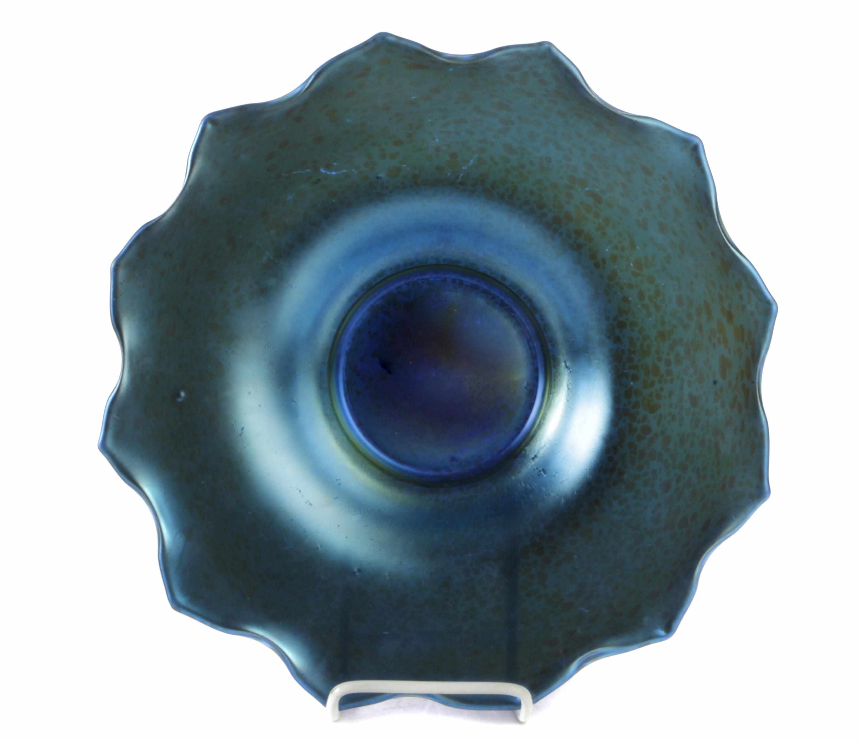 Appraisal: A blue iridescent glass bowl early th centuryunsigned diameter in