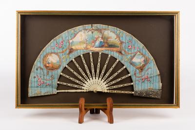 Appraisal: A Regency fan with painted vignettes of figures in landscapes