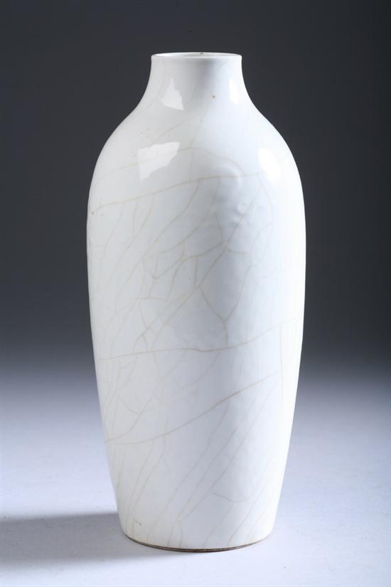 Appraisal: CHINESE MONOCHROME WHITE PORCELAIN VASE Qianlong period Ovoid-form molded to