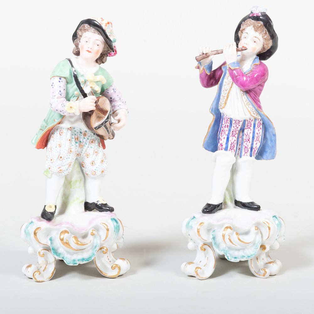 Appraisal: Pair of Samson Porcelain Figures of Boy Musicians The tallest