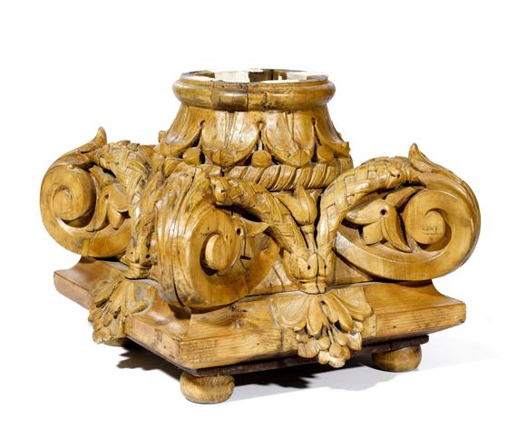 Appraisal: A CARVED CAPITAL AS A TABLE BASE in Neo-classic style