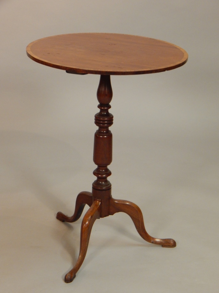 Appraisal: A Victorian mahogany occasional table the circular top with a