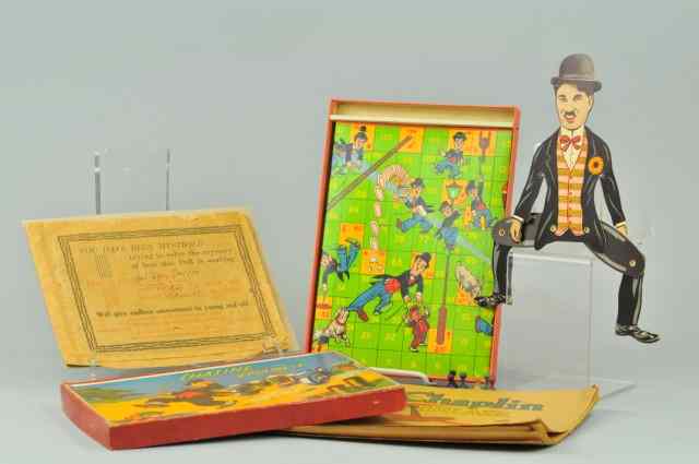 Appraisal: CHARLIE CHAPLIN BOOKLET GAME AND PAPER FIGURE Mixed lot features